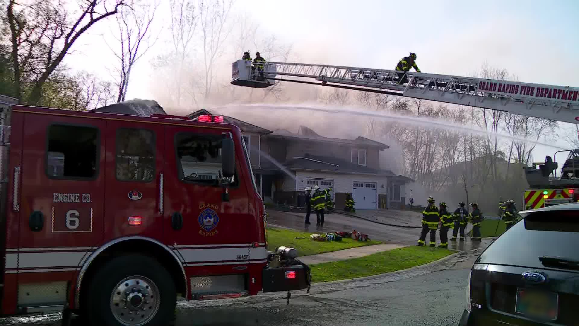 Firefighters Battle Flames at Multiplex Home in Grand Rapids