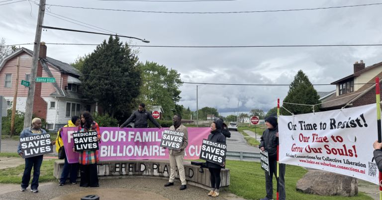 Michigan Activists Protest GOP Plan to Cut Medicaid With Bridge Banner Action