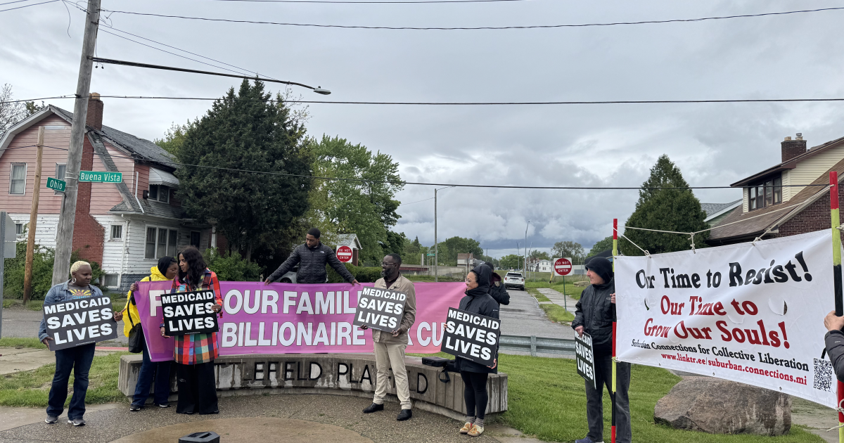 Michigan Activists Protest GOP Plan to Cut Medicaid With Bridge Banner Action