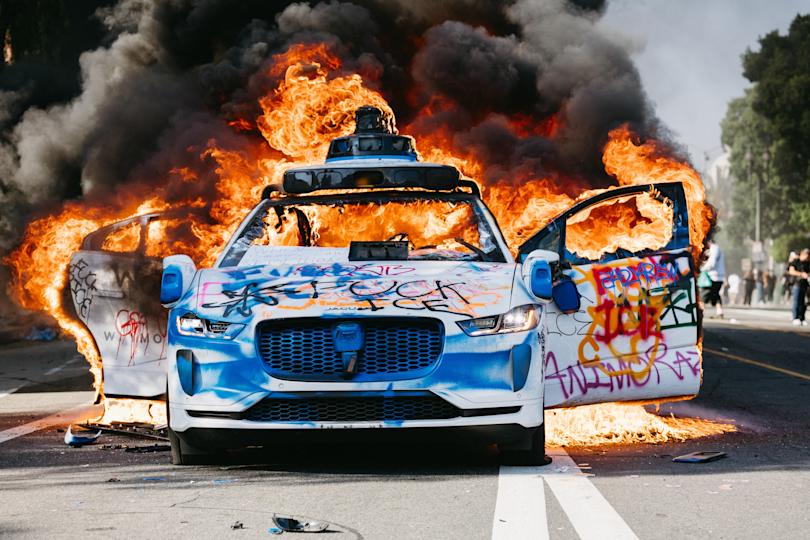 Waymo Halts Service in Downtown L.A. After Self-Driving Cars Set on Fire During Protests